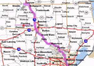 a map close up of the 1-75 corridor in Michigan. It has a pink highlighted line that follows the corridor.