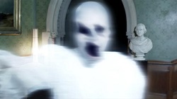 A spooky distorted face and torso in what looks like a Victorian-era room