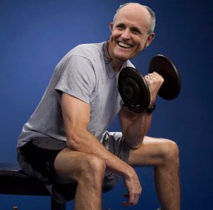A composite of Rudy Giuliani's head on Paul Ryan's dumbell-curling body